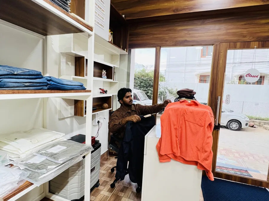 Premium men's wear shelves at the D Iconique showroom